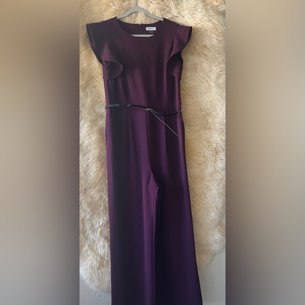 Calvin Klein Belted Ruffle-Sleeve Jumpsuit In Purple. - Picture 1 of 5